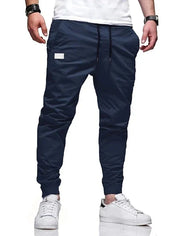 Pantalón de color liso con puño